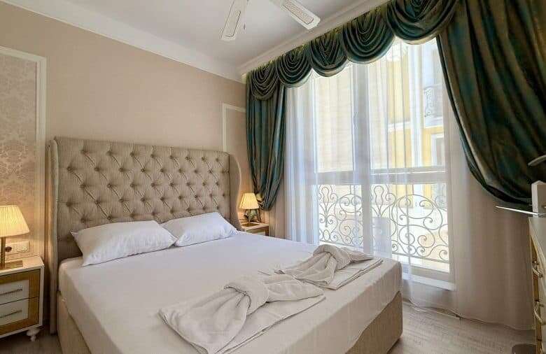 Elegant bedroom in luxury apartment at Harmony Suites, Sunny Beach.