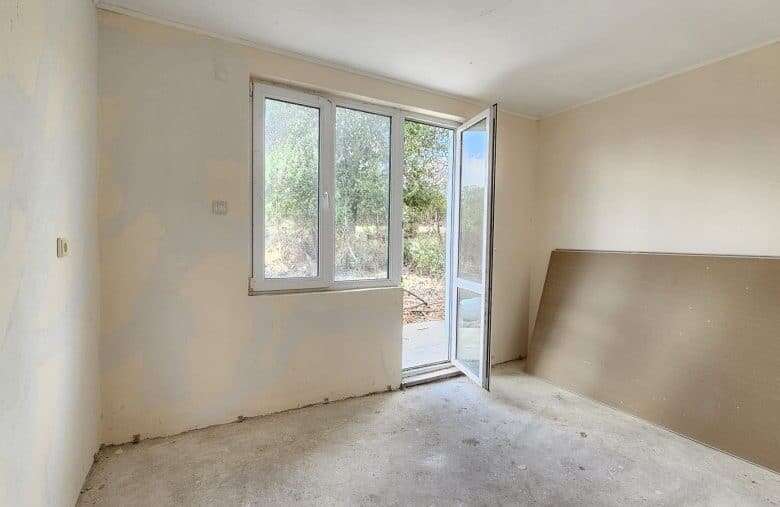 Bright interior of a 2-bedroom bungalow near Sredets, Bulgaria.
