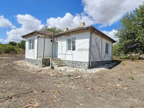 Bright 2-bedroom bungalow located in Dyulevo village, just 5 km from Sredets, offering peaceful rura.