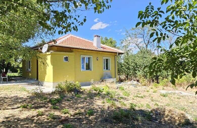 Bright yellow renovated house with spacious land in Dyulevo, near Burgas, Bulgaria.