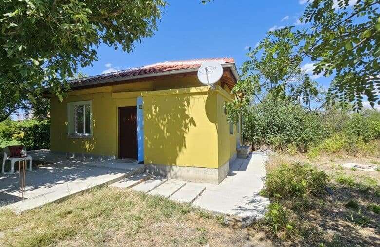 Bright yellow renovated house on spacious land near Burgas, Bulgaria.