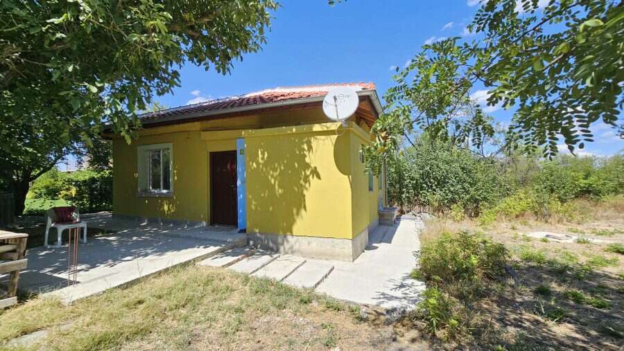 Bright yellow renovated house on spacious land near Burgas, Bulgaria.