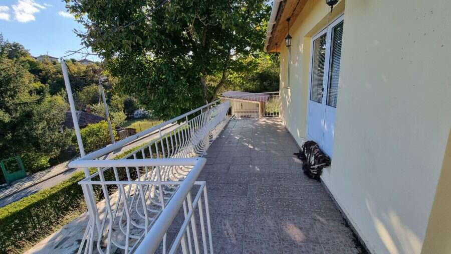 Spacious balcony of a 3-bedroom house featuring a pool and BBQ area in Ropotamo Valley, 18 km from P.