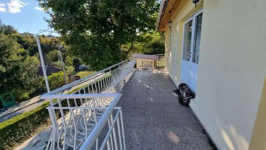 Spacious balcony of a 3-bedroom house featuring a pool and BBQ area in Ropotamo Valley, 18 km from P.