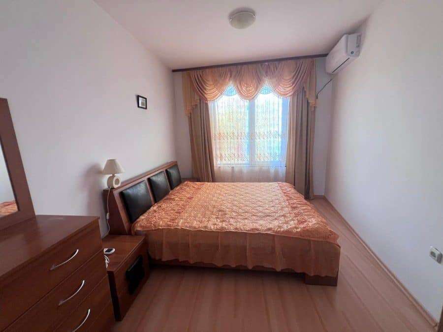 Bright bedroom with pool view in Sunny Day 3 Premium, Sunny Beach.