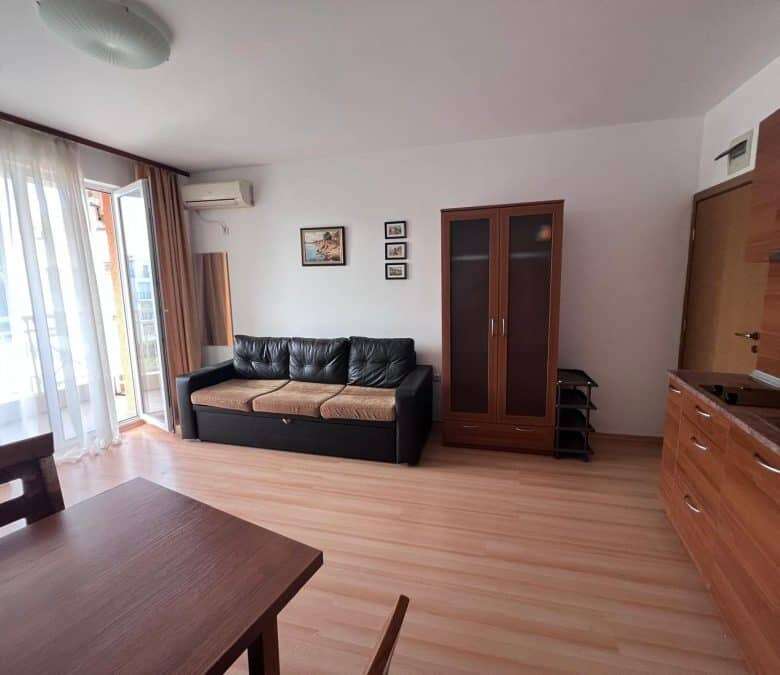 Bright living room with sofa and balcony access, in Sunny Day 3 Premium, Sunny Beach.
