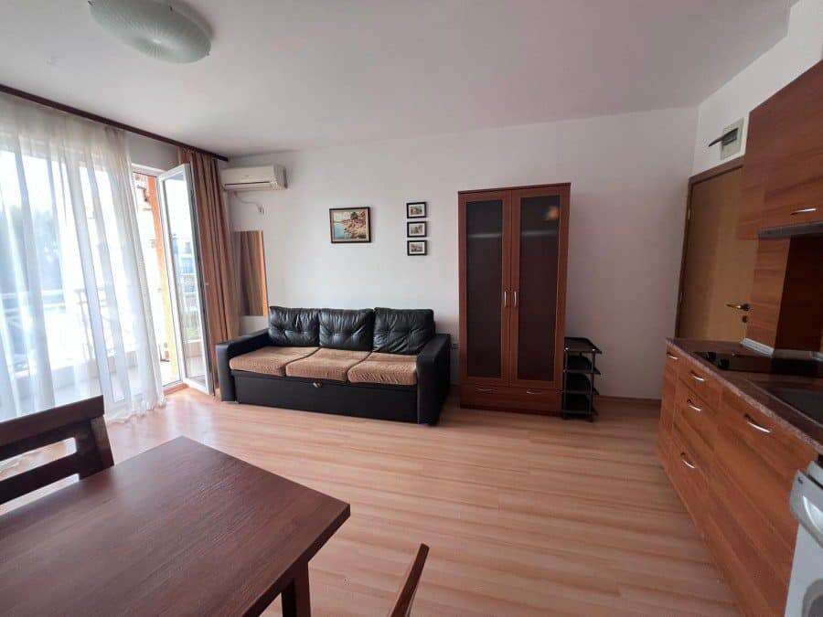 Bright living room with sofa and balcony access, in Sunny Day 3 Premium, Sunny Beach.
