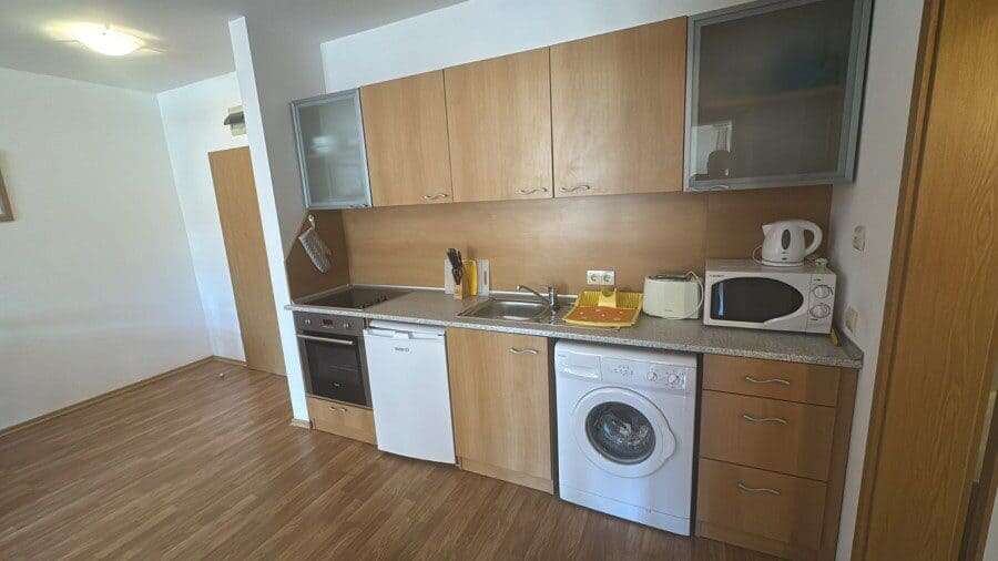 Cozy Furnished Kitchen in Vineyards SPA Resort Modern kitchen with appliances in Vineyards SPA Resort apartment.