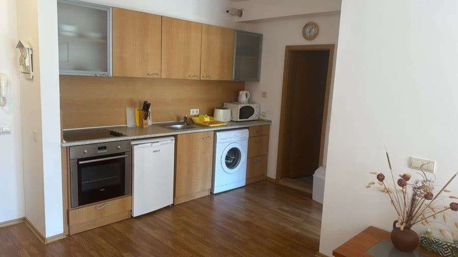 Modern furnished kitchen in Vineyards SPA Resort apartment Furnished kitchen with appliances in Vineyards SPA Resort, near the sea.