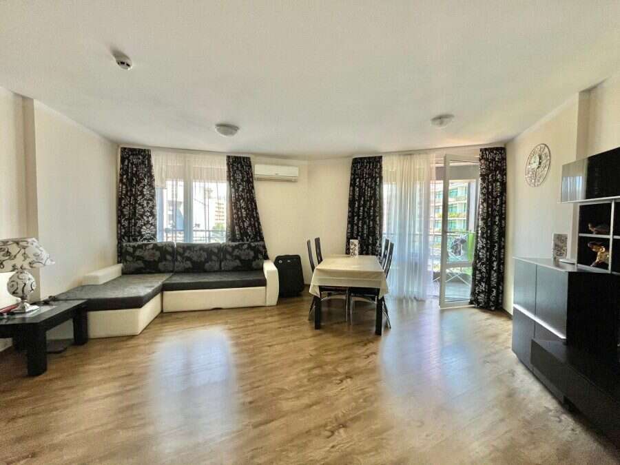 Spacious 1-bedroom apartment in Sunny Beach Plaza, 100m from the sea, with bright living area and ba.