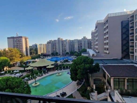 View of pool and surrounding buildings from a studio apartment in Sunny Beach, Bulgaria.