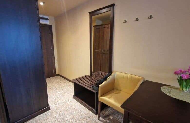 Interior view of a studio apartment in Barcelo Royal Beach, Sunny Beach, featuring a small seating a.