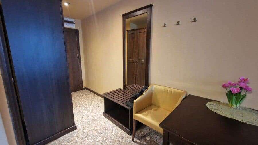 Interior view of a studio apartment in Barcelo Royal Beach, Sunny Beach, featuring a small seating a.
