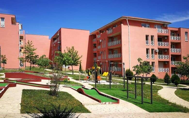 Modern residential complex with landscaped gardens in Sunny Day 6.