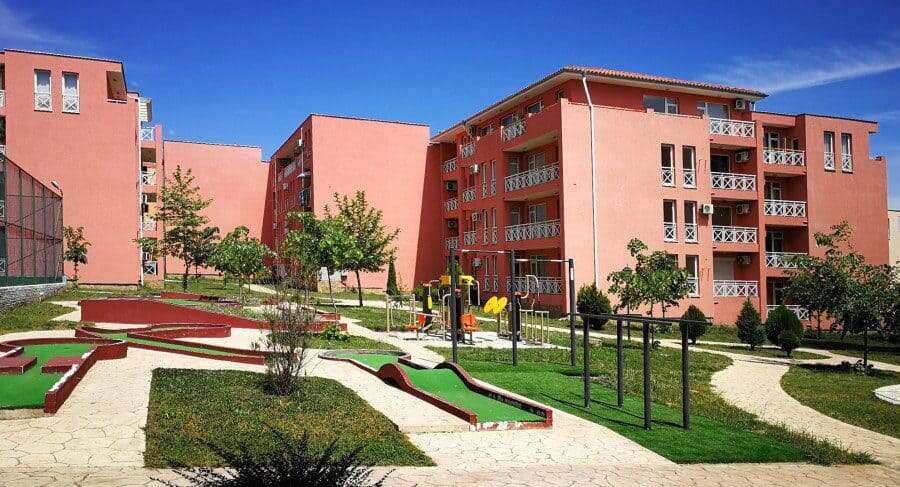 Modern residential complex with landscaped gardens in Sunny Day 6.