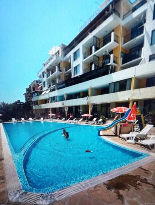 Bright outdoor pool at Blue Summer complex in Sunny Beach, Bulgaria.