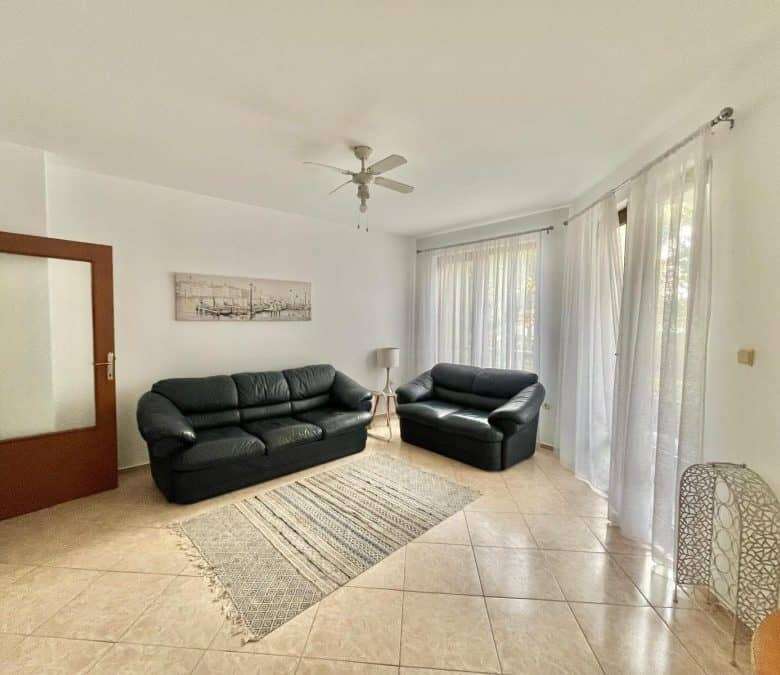 Sea view living room in Nessebar 2-bedroom apartment for sale.
