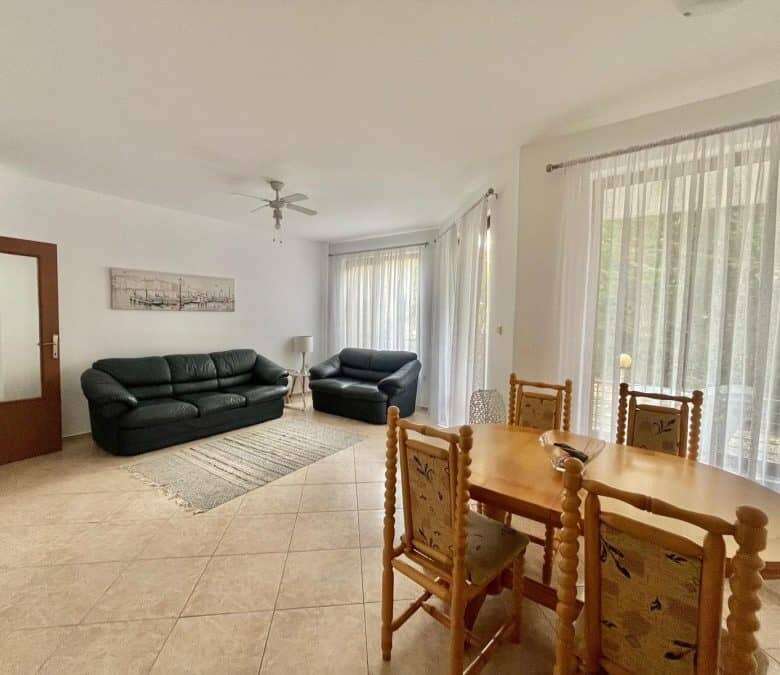 Sea view 2-bedroom apartment for sale in Nessebar's Global City, featuring spacious living area and.
