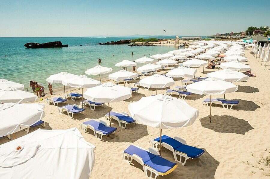 Beach with sunbeds and umbrellas in Nessebar, close to the sea. Beach with sunbeds and umbrellas in Nessebar, just 30 meters from the sea.