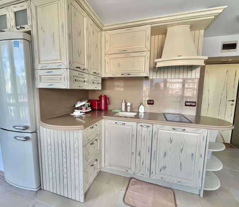 Bright kitchen with sea view in Nessebar, 30m from the beach. Modern cabinetry and appliances in a c.