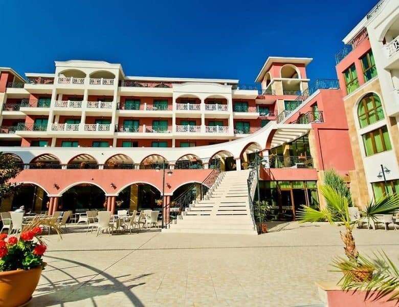 Bright, colorful residential complex near the sea with spacious balconies.