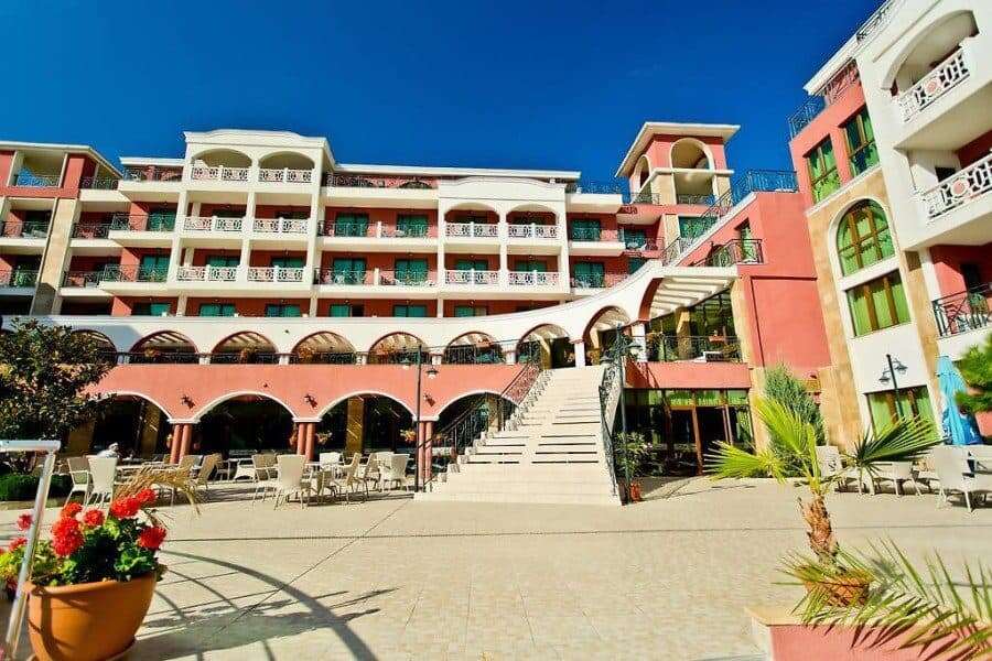 Bright, colorful residential complex near the sea with spacious balconies.