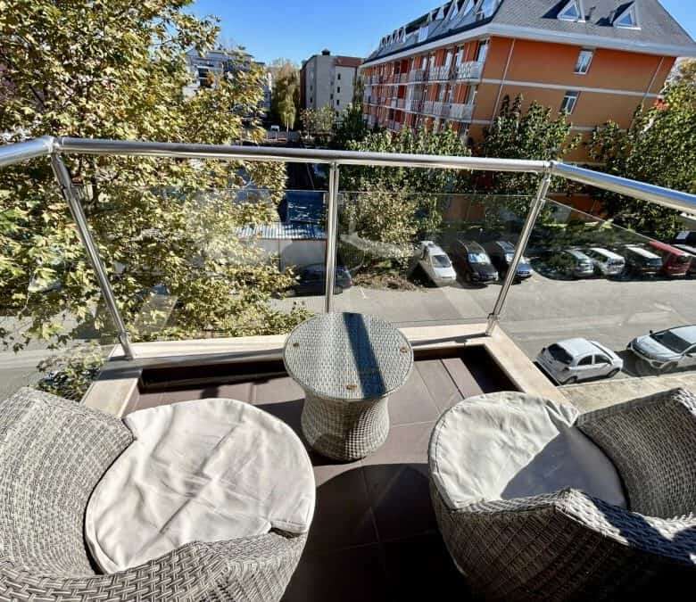 Balcony with seating overlooking Sunny Beach and surrounding buildings. Perfect for relaxing in a 1-.