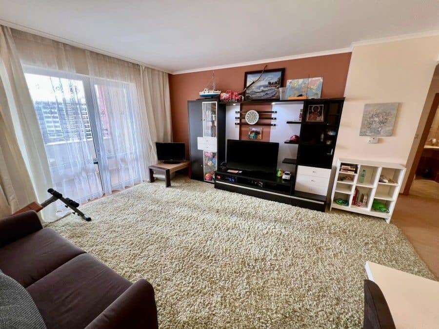 Spacious Living Room with Sea Views in Majestic Sunny Beach Bright living room featuring large windows with stunning sea views in Majestic Sunny Beach apartment.