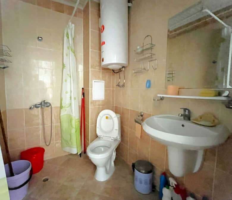 Bright bathroom with modern fixtures and essentials for comfortable living.