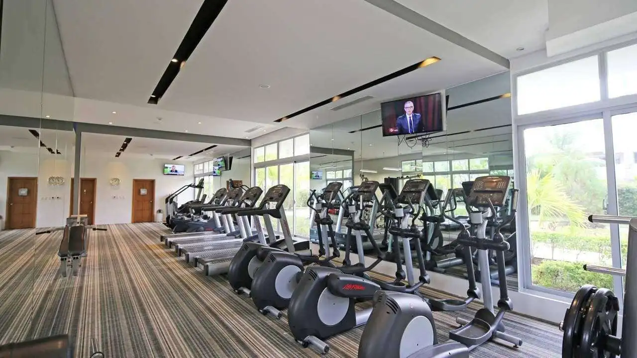 Well-equipped gym with cardio and strength equipment at Coral Bahia Punta Cana.