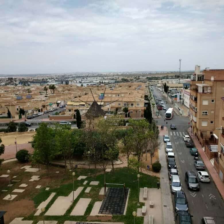 Modern 2-bedroom penthouse in Torrevieja with city views, balcony, and nearby amenities.