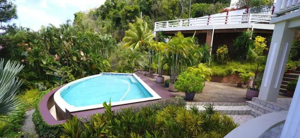 Poolside view of a luxury 5-bedroom villa in Harmony Hall, Prospect, St. Vincent.
