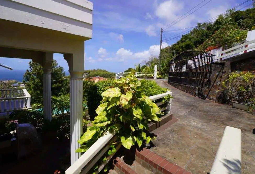 Villa with lush greenery and scenic views in Prospect, St. Vincent.