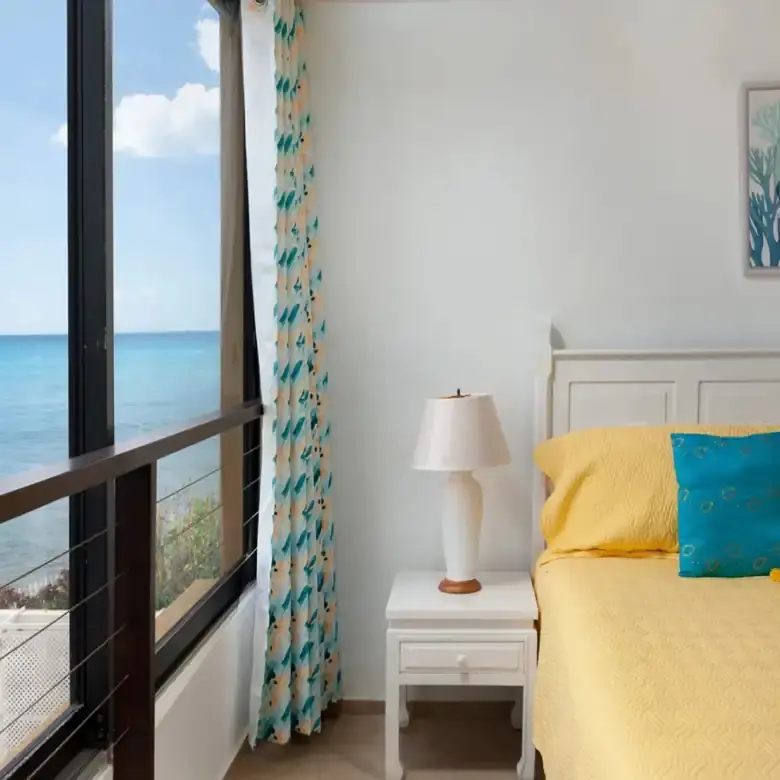 Beachfront 2-bedroom apartment with stunning ocean views in Christ Church, Barbados. Perfect for sea.
