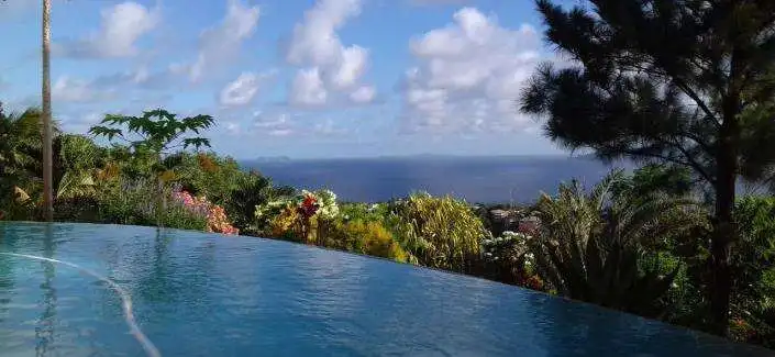 Elegant 5-bedroom villa with stunning ocean views in Harmony Hall, Prospect, St. Vincent. Perfect fo.