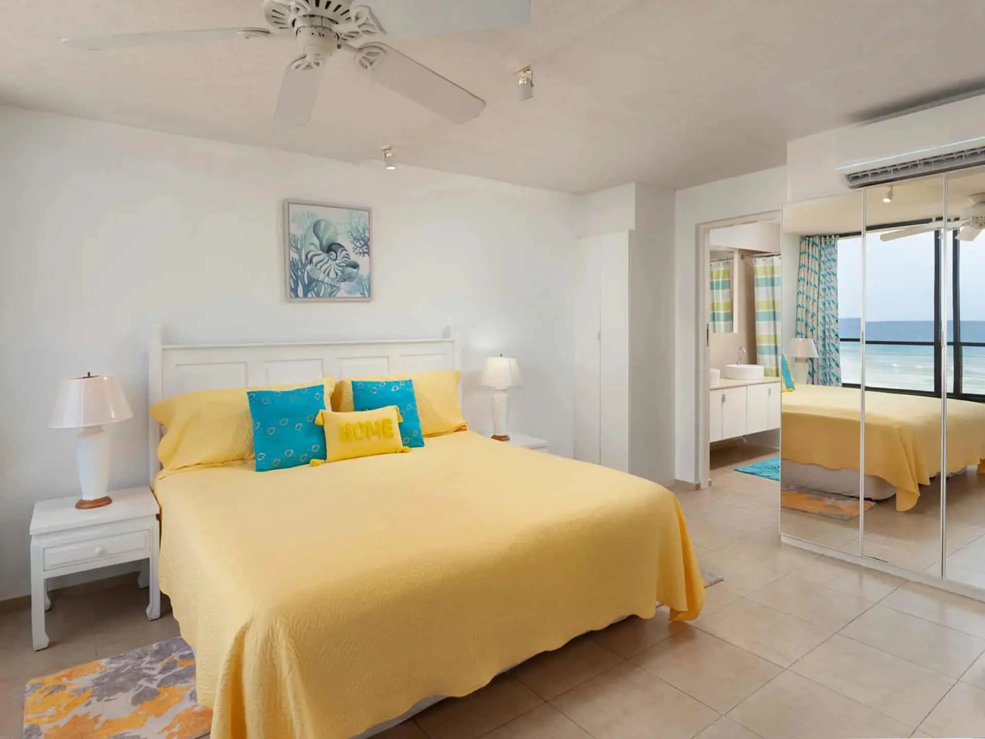 Contemporary kitchen with wooden cabinets and stainless steel appliances in Panama City luxury apart.