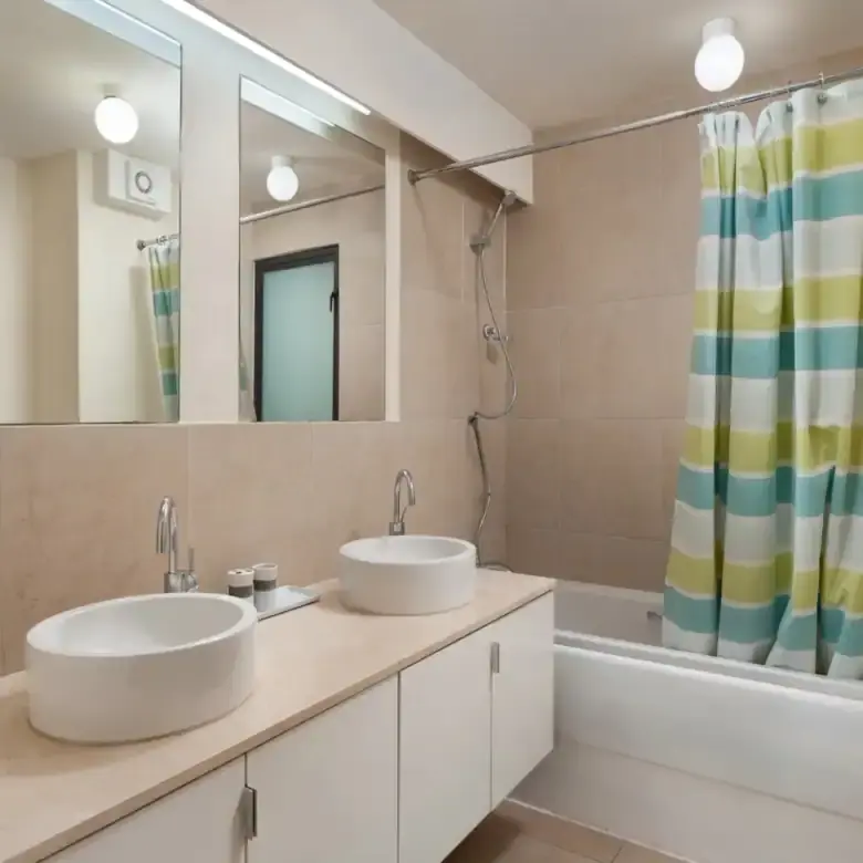 Modern penthouse terrace overlooking Torrevieja cityscape and distant sea views.