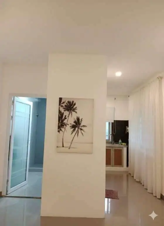 Modern 3-bed house interior with open-plan kitchen and bright living space in Siargao Island.