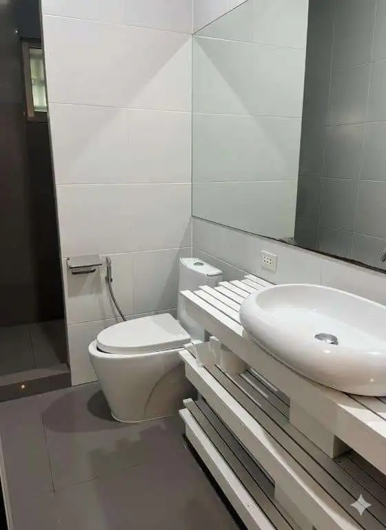 Modern bathroom with sleek design and contemporary fixtures.