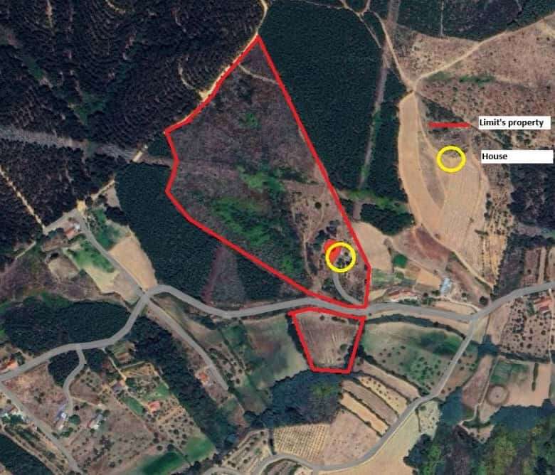 Spacious land parcel outlined in red near the house and property boundary.