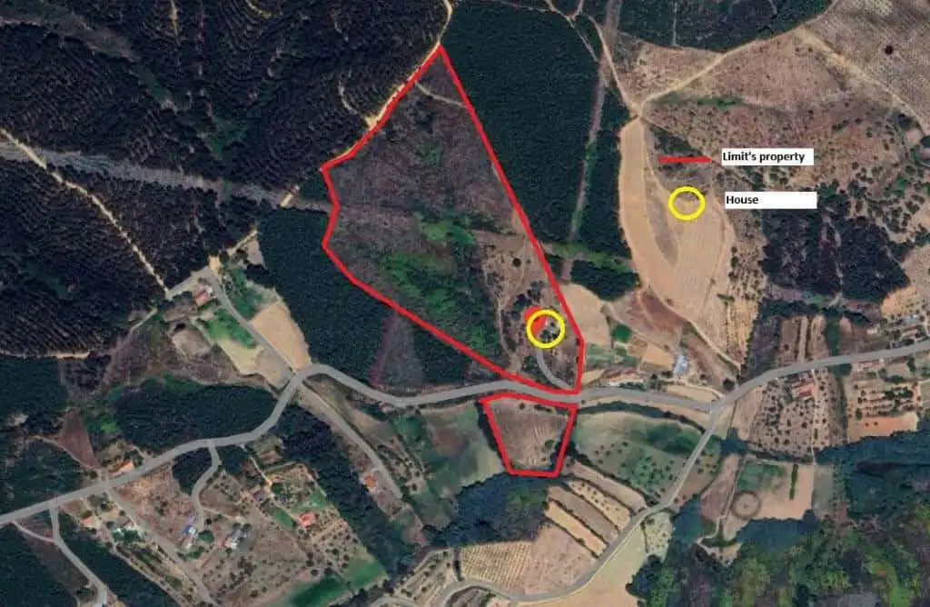 Spacious land parcel outlined in red near the house and property boundary.