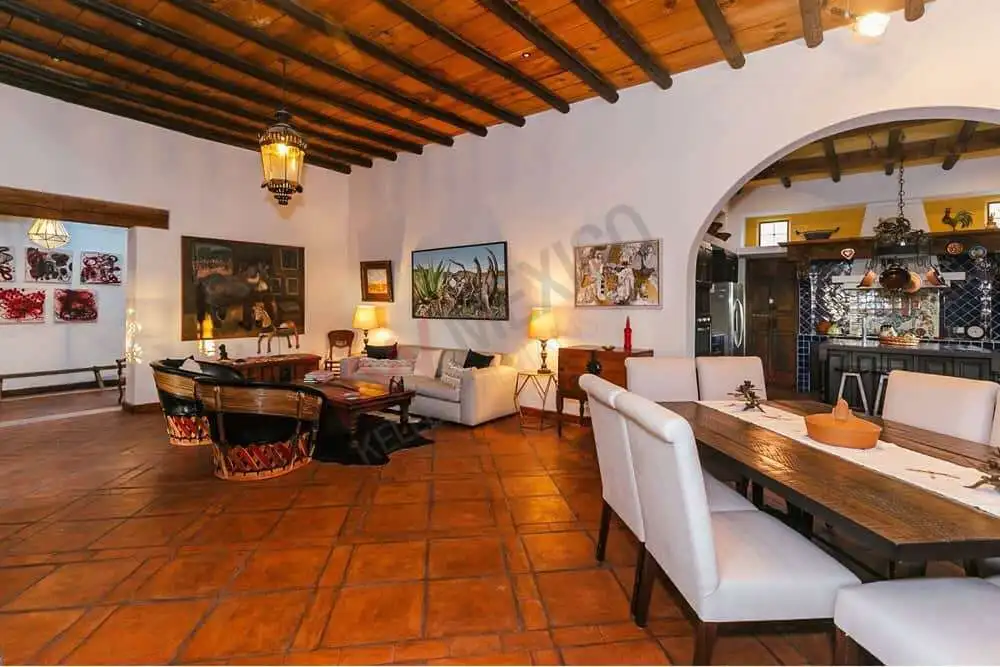 Luxury Colonial Living Room with Rustic Decor Elegant colonial estate interior with traditional wooden ceiling and cozy lighting.