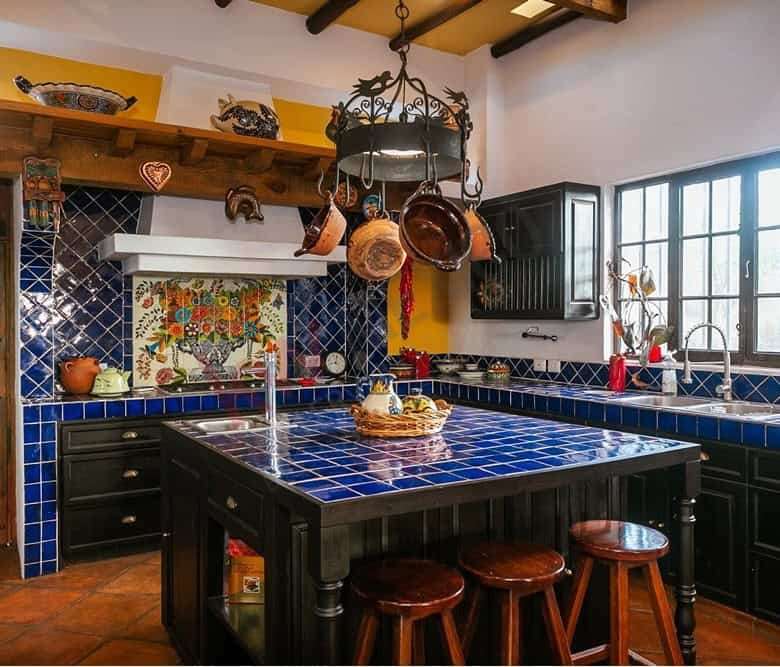 Style kitchen featuring vibrant blue tiles and rustic wooden accents.