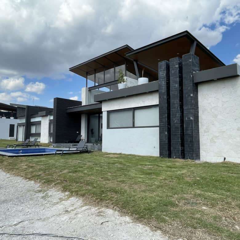 Elegant contemporary home with rooftop views, private pool, and spacious outdoor areas in a scenic v.
