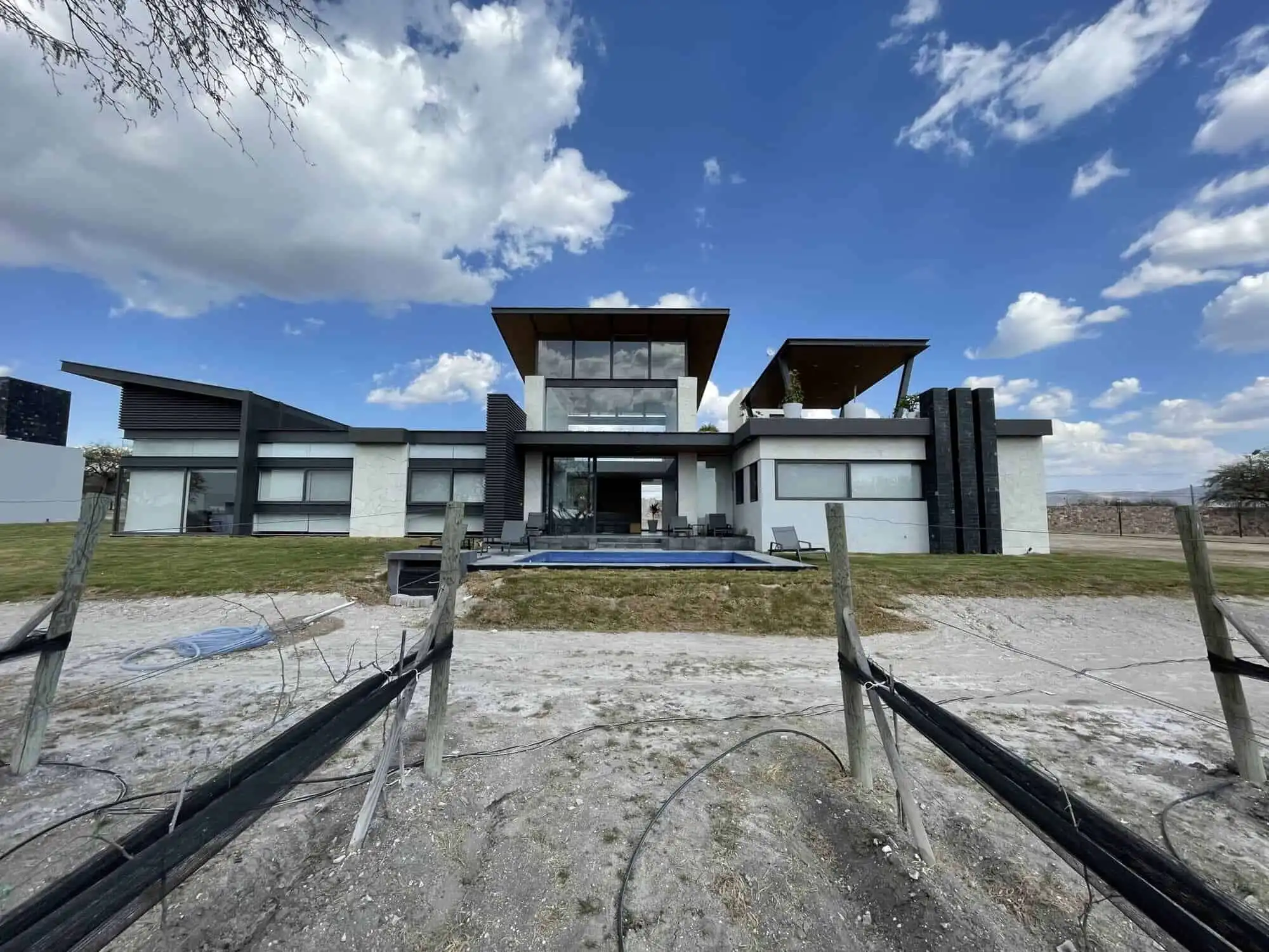 Luxurious vineyard estate with contemporary design, spacious interiors, and scenic views in San Migu.