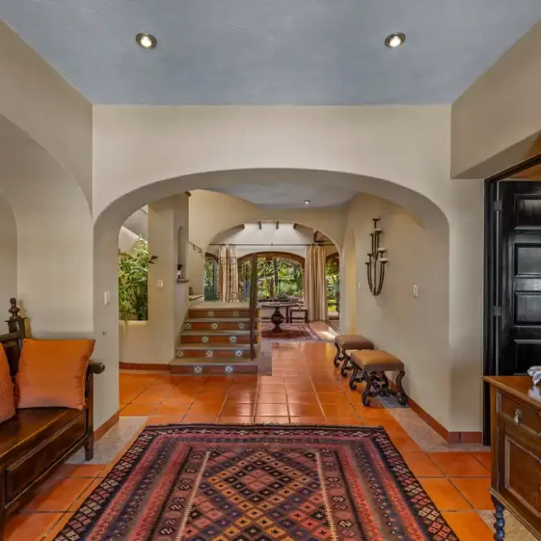 Elegant Rancho Los Labradores home interior with traditional decor and spacious entryway in San Migu.