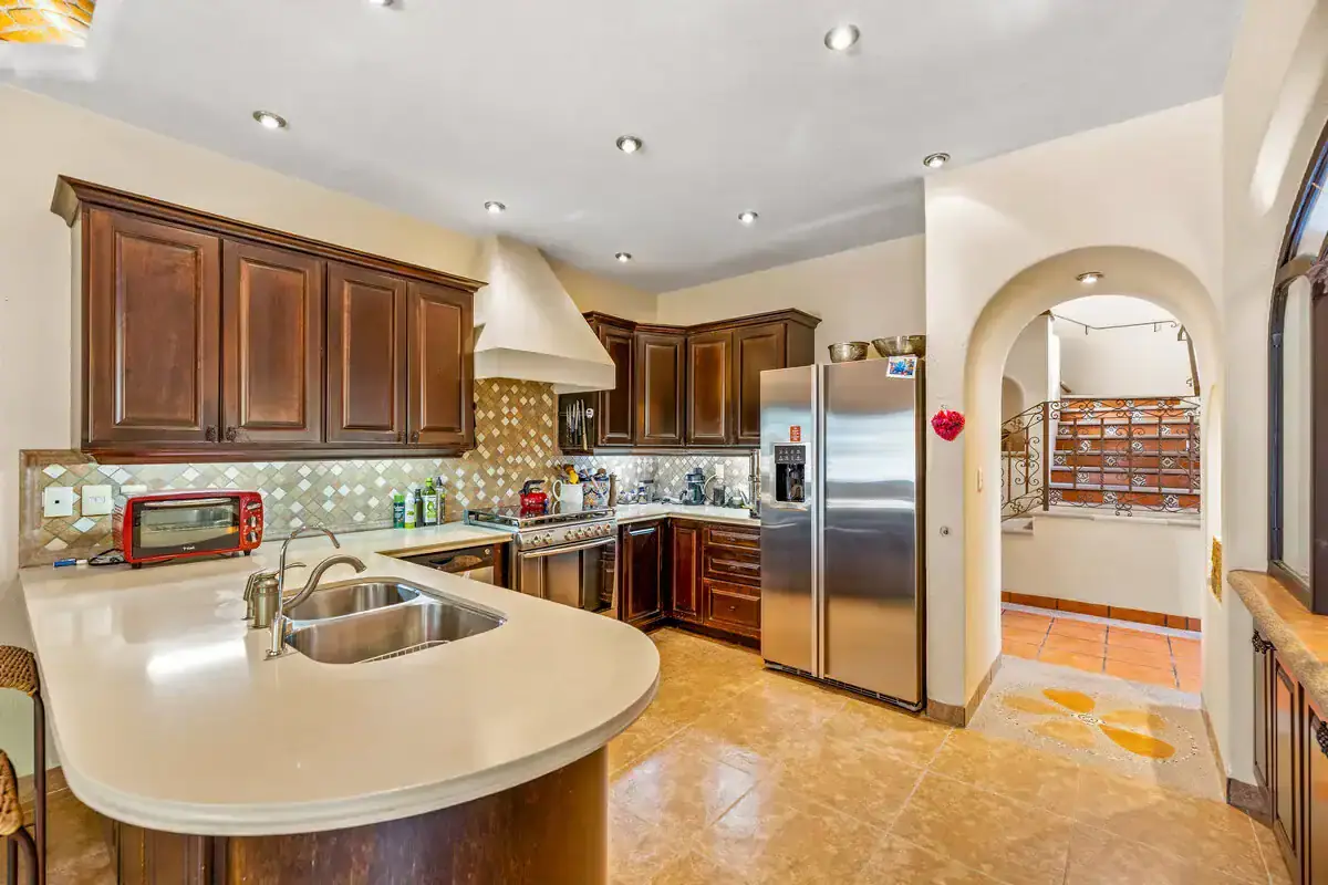 Lakefront Rancho Los Labradores Home Beautiful kitchen in Rancho Los Labradores with lake views.