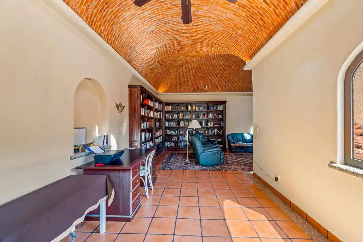 Lakefront Rancho Los Labradores Home Interior view of a cozy library room in a lakefront home in Rancho Los Labradores, San Miguel de All.