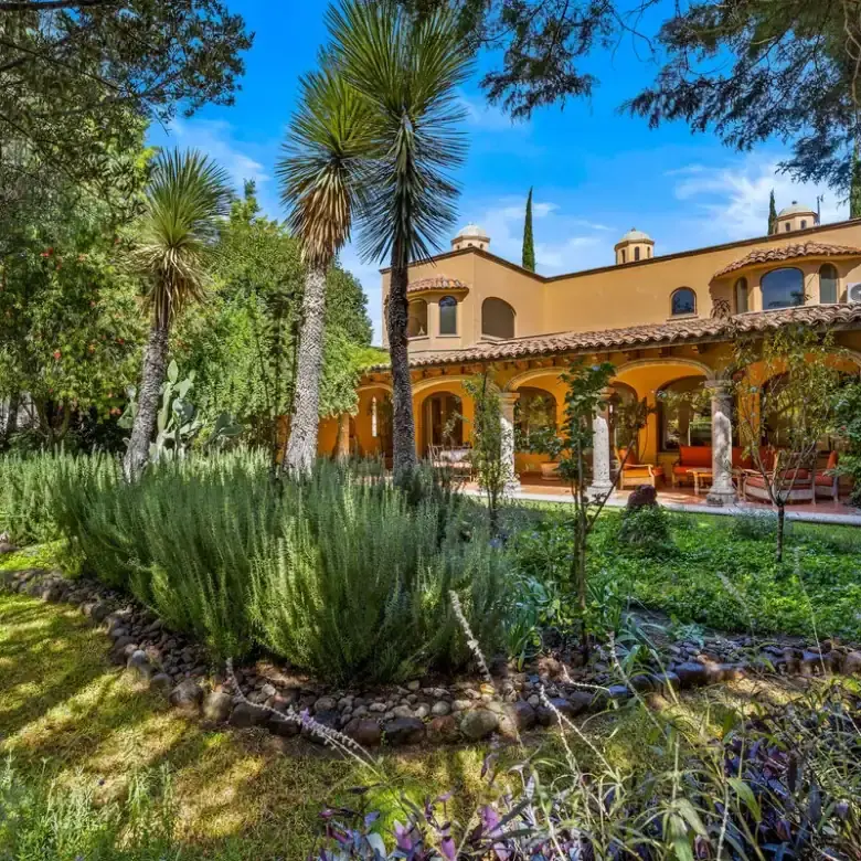 Beautiful lakefront home in Rancho Los Labradores, San Miguel de Allende, featuring lush gardens and.