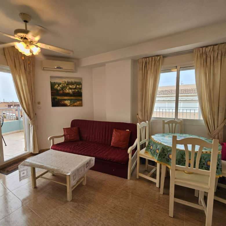 Elegant 2-bedroom penthouse with balcony in Torrevieja, ideal for seaside living and investment.